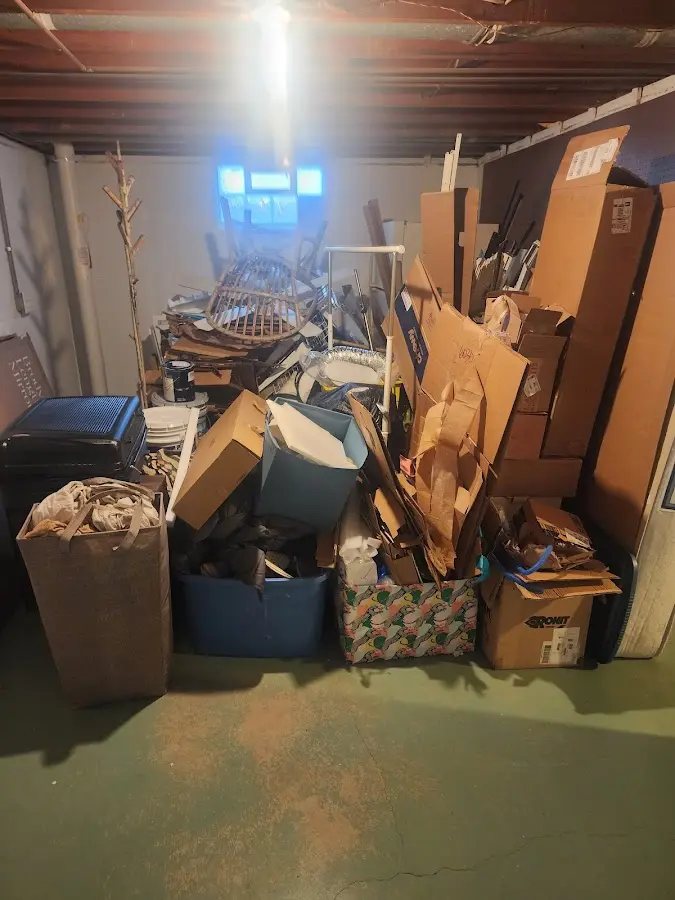 Roll-off dumpster container at job site for 15 Yard Dumpster Rental in Fort Bragg